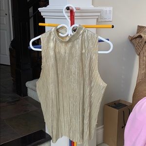 Silver and gold  shirt more silver then gold